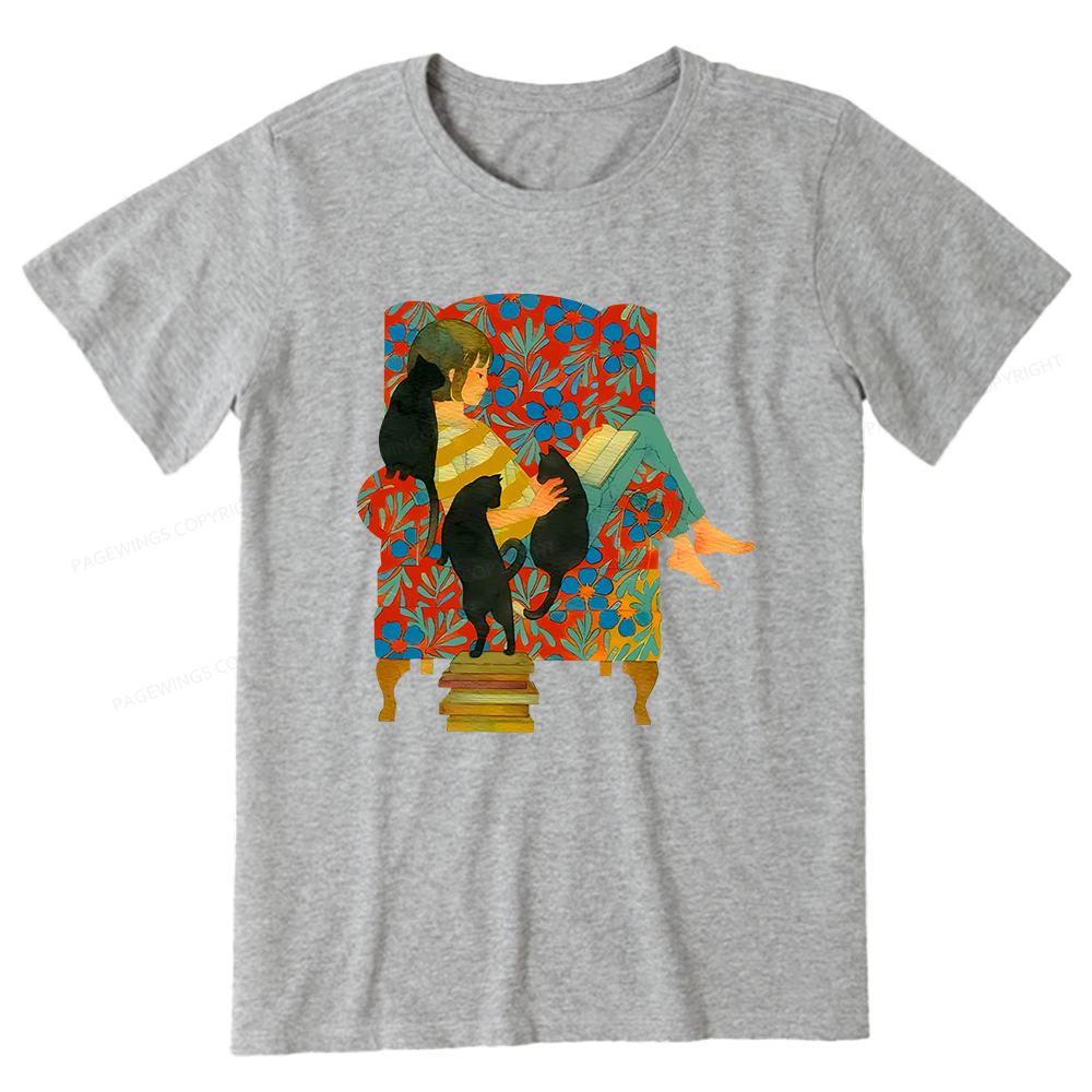 Pagewings A girl reading a book on the sofa Unisex Classic T-shirt