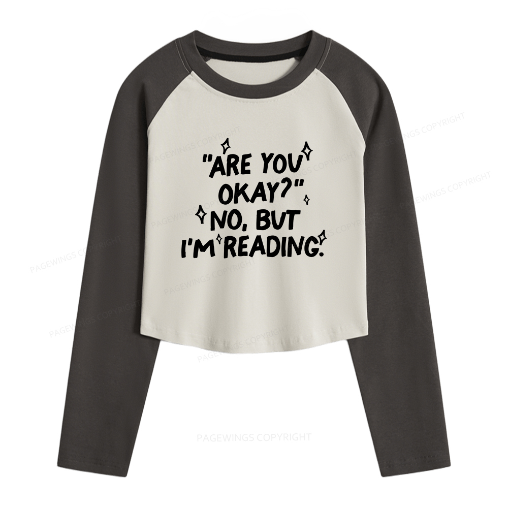 Pagewings Are You Okay No But I'm Reading Women Long Sleeve Crop Raglan T-shirt