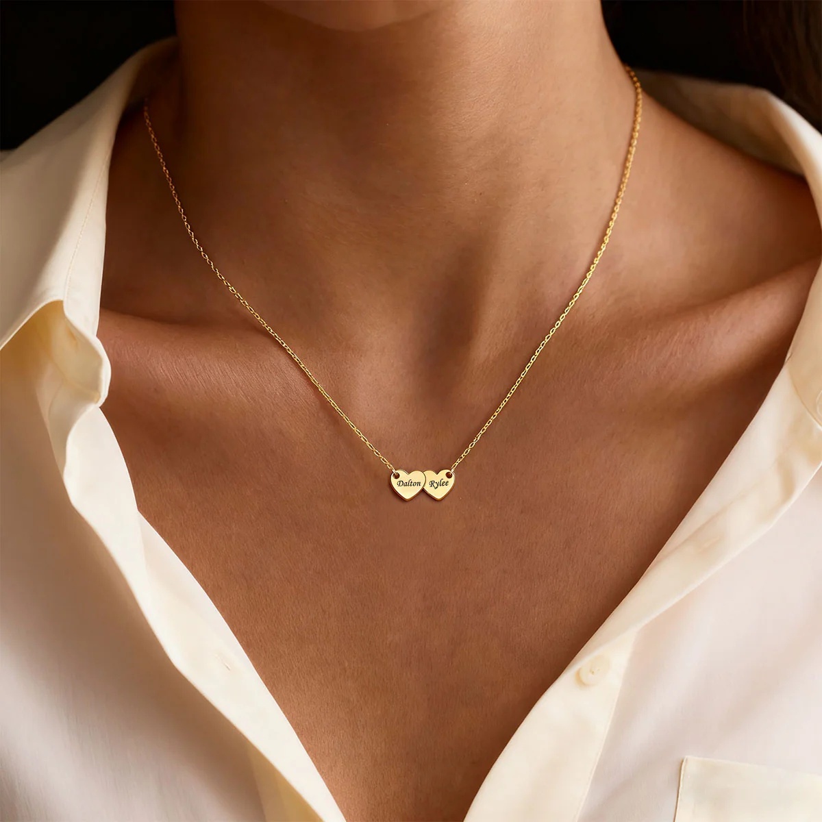 A Woman Wearing Custom Engraved 2 Hearts Name Necklace