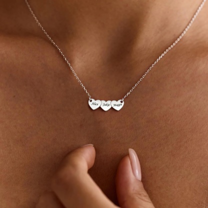 A Woman Wearing Custom Engraved 3 Hearts Name Necklace