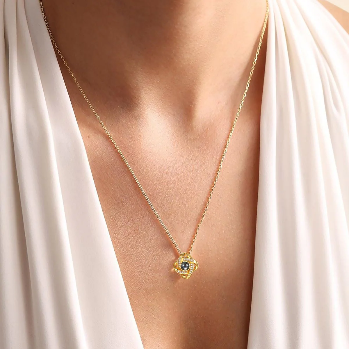 A Woman Wearing Custom Quadruple Love Knot Photo Projection Necklace
