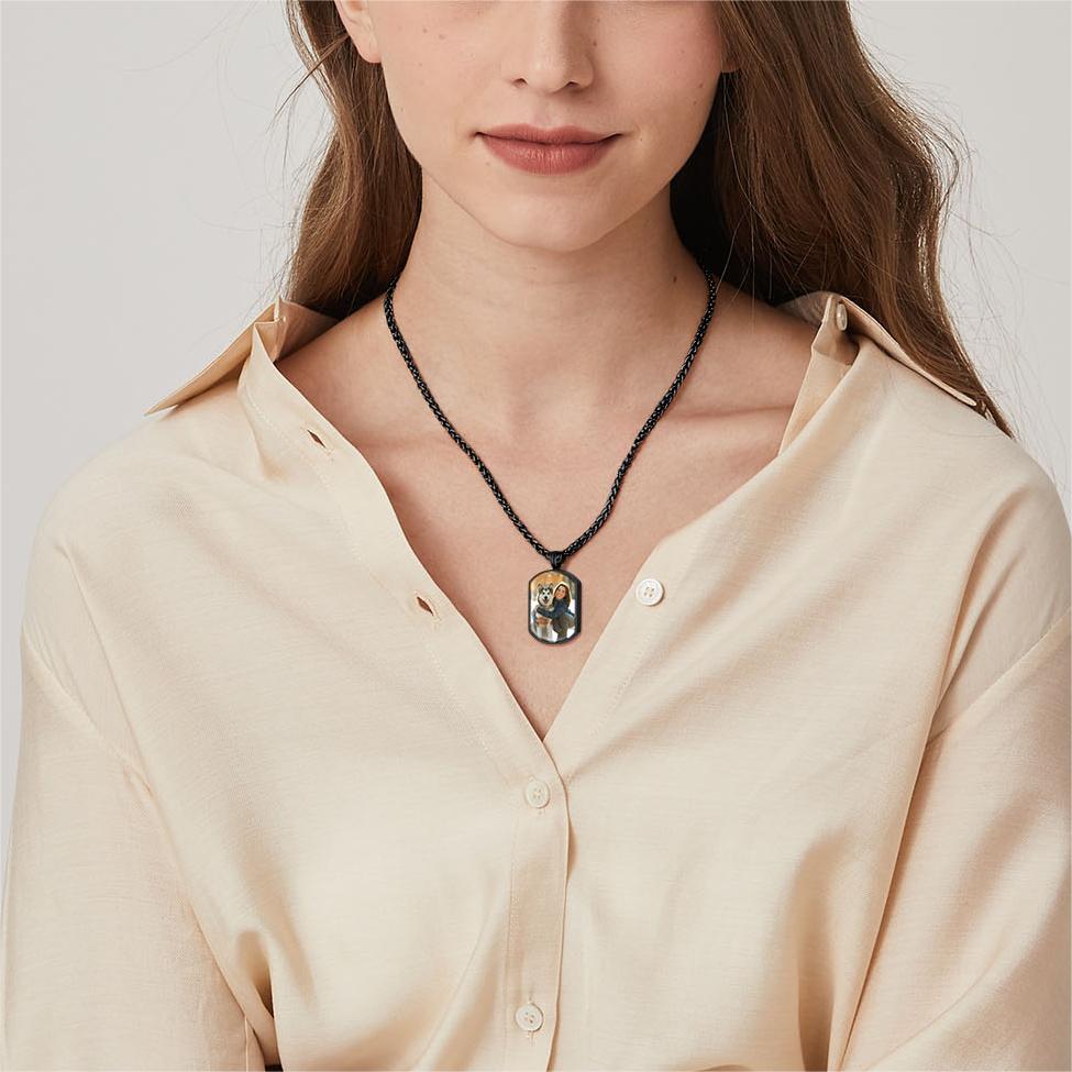 woman wearing black urn necklace for ashes