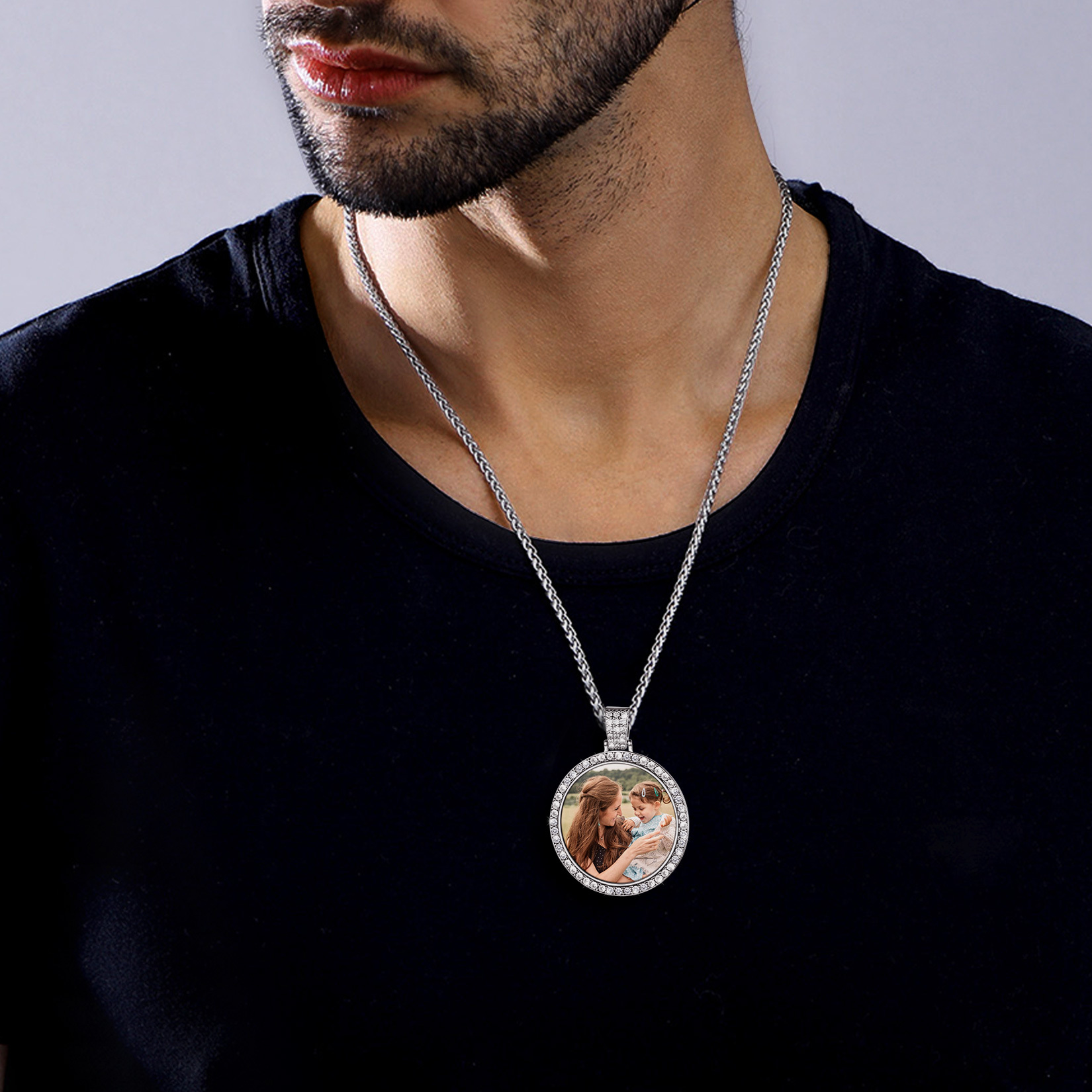 man wearing silver circle chain photo necklace