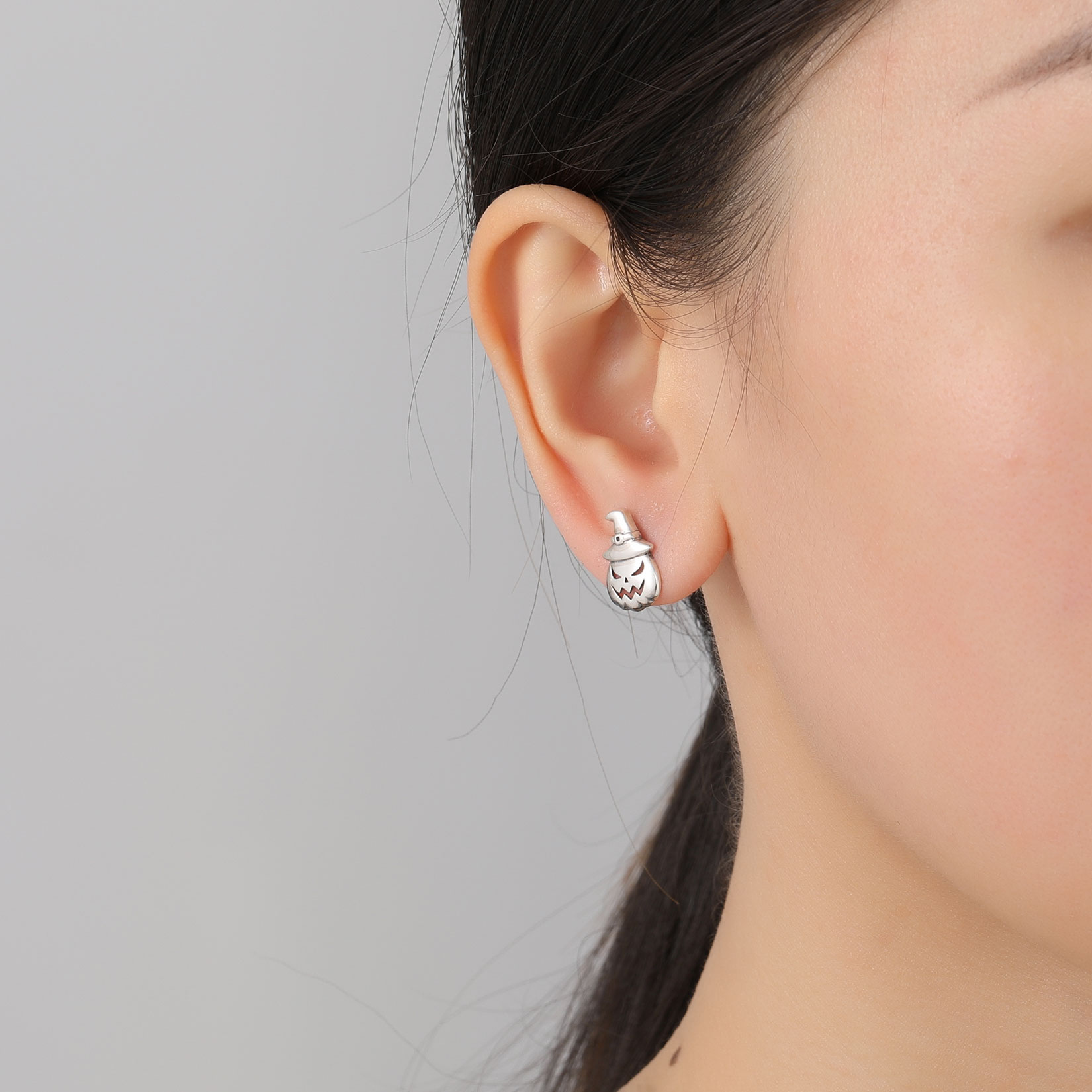 women wearing S925 Silver Pumpkin Jack Earrings
