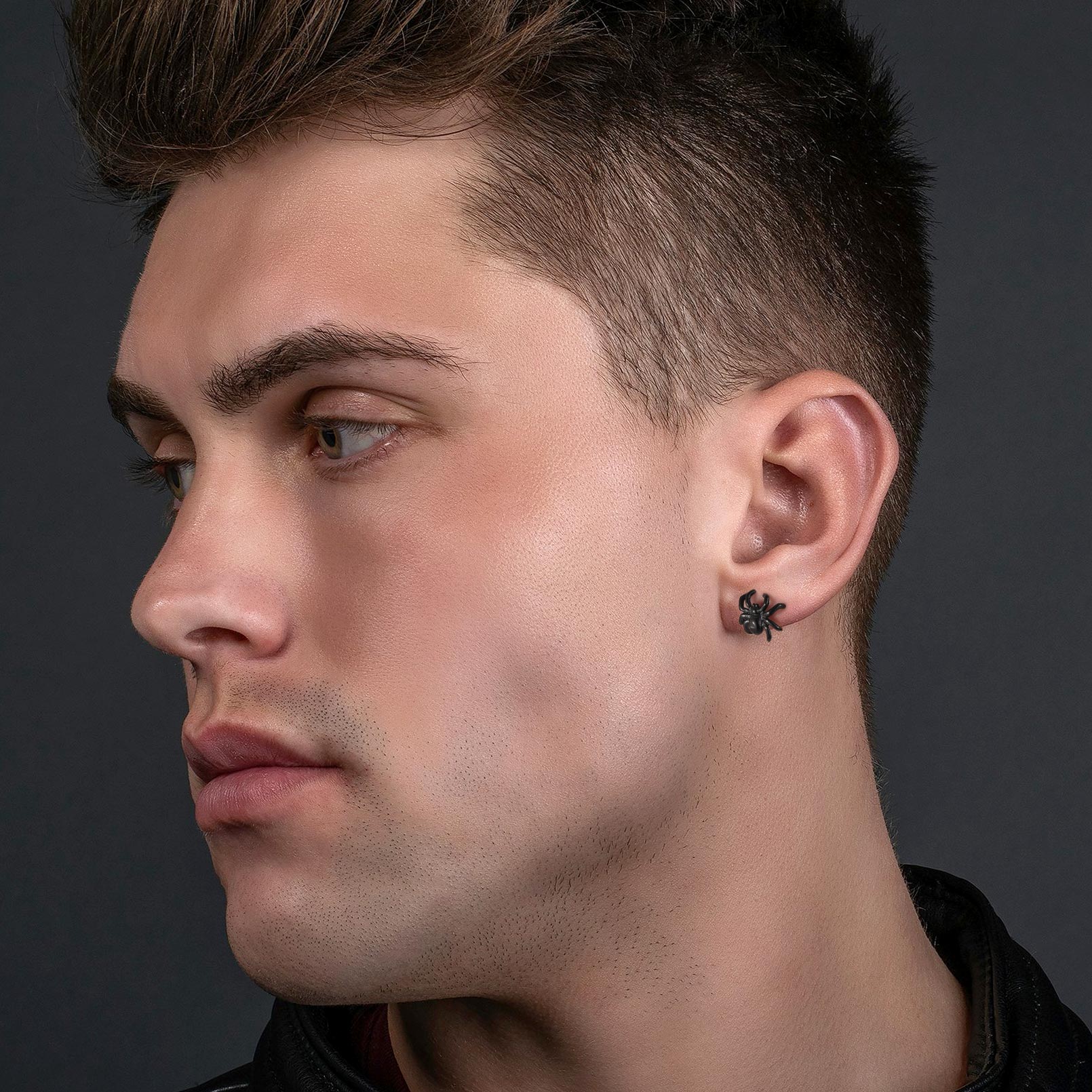 a men wearing Spider Stud Earrings