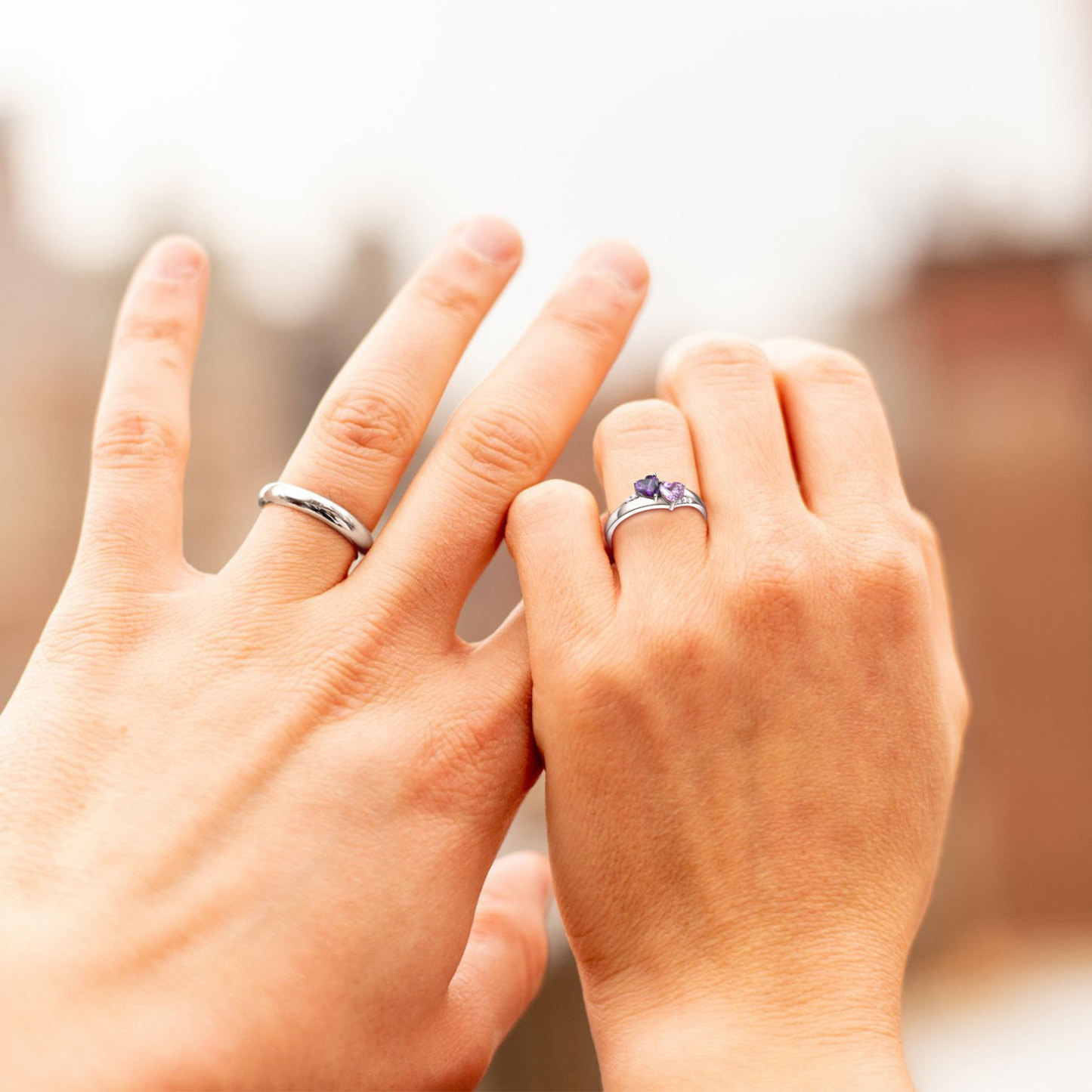 couple wearing Birthstone Promise Ring