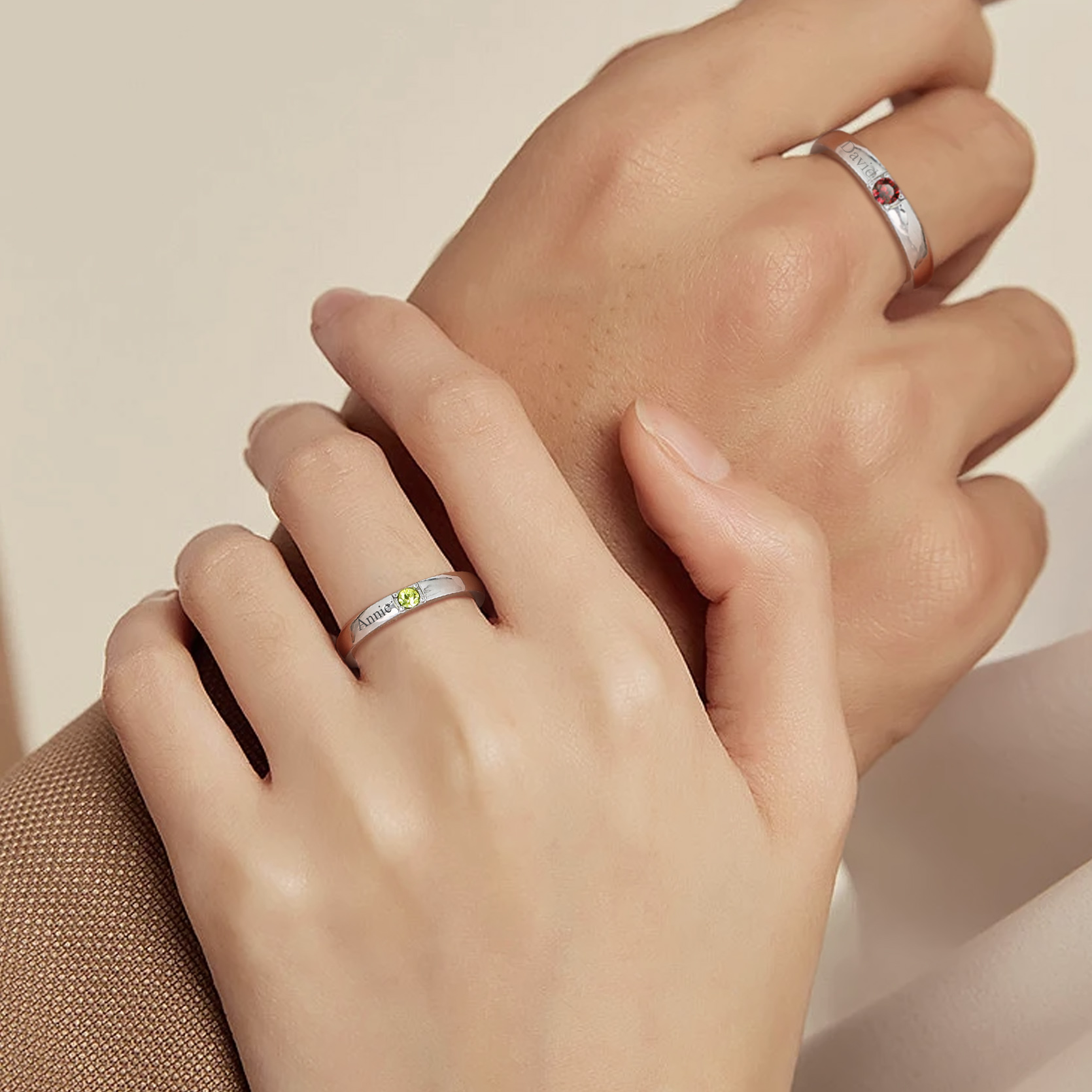 couple wearing silver Birthstones ring