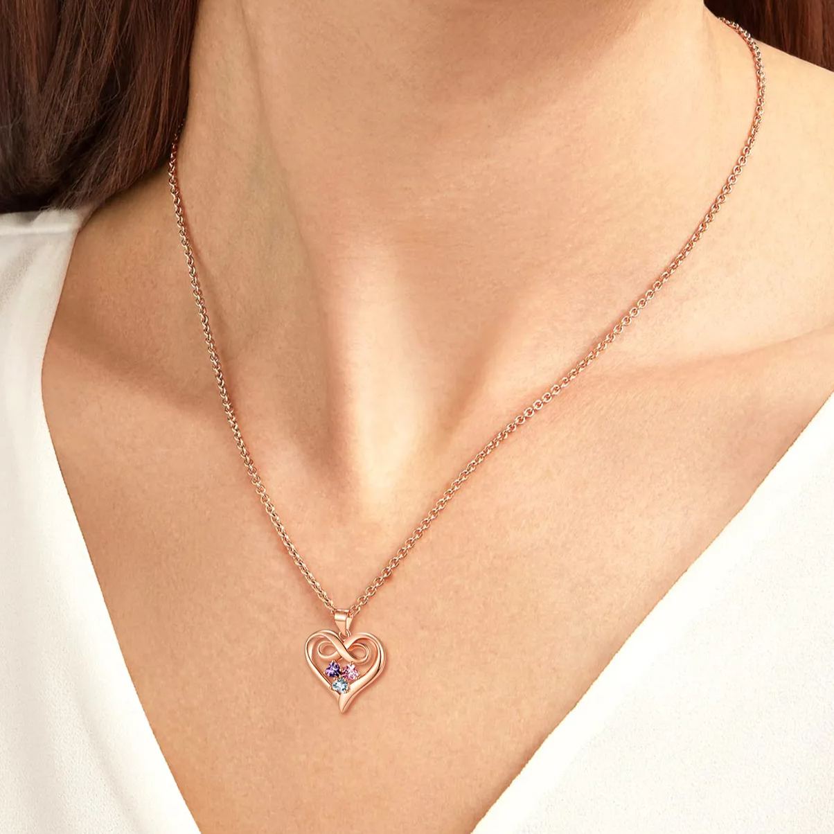women wearing Infinity 3 Birthstones Heart Necklace
