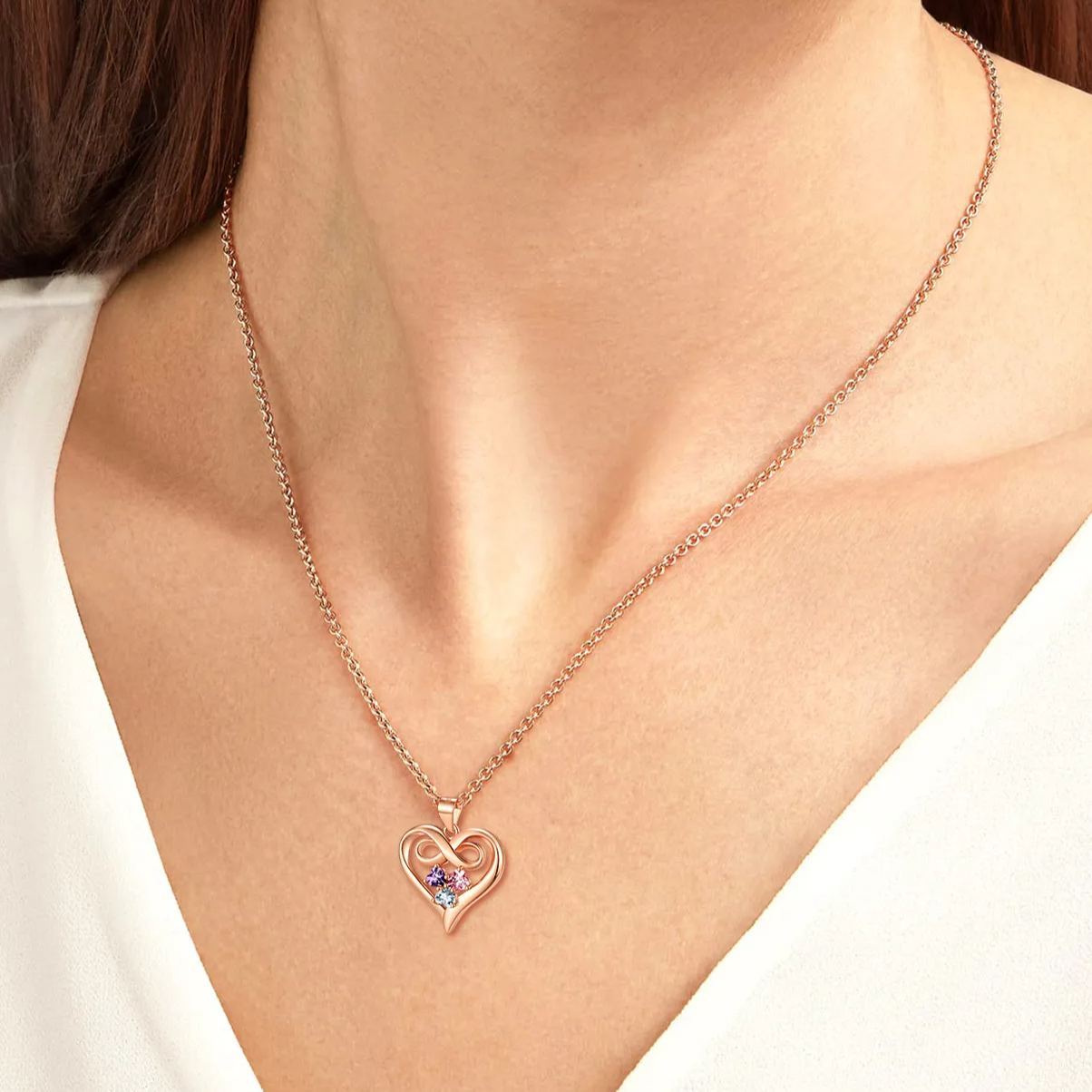 women wearing Infinity 3 Birthstones Heart Necklace