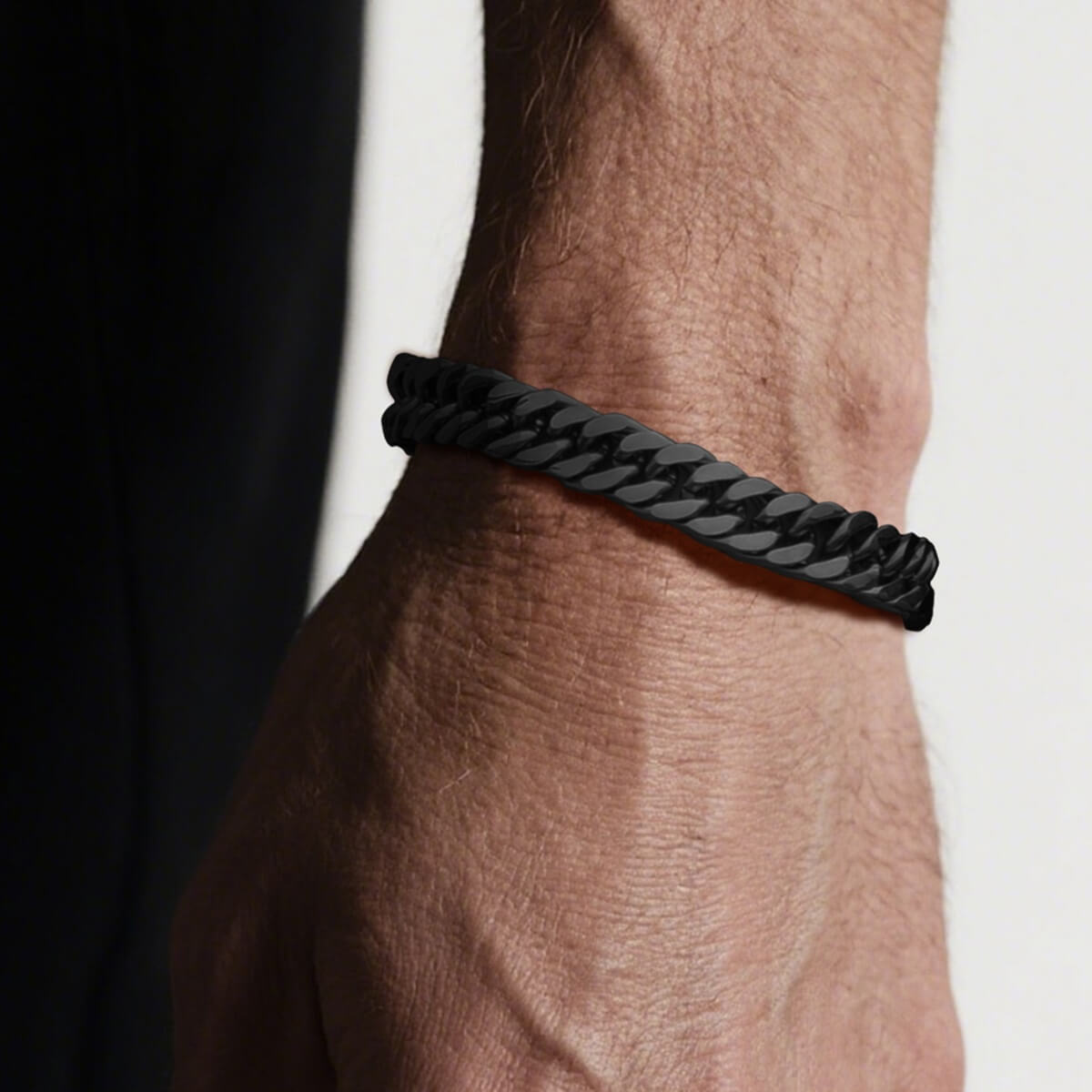 man wearing black Curb Chain bracelet