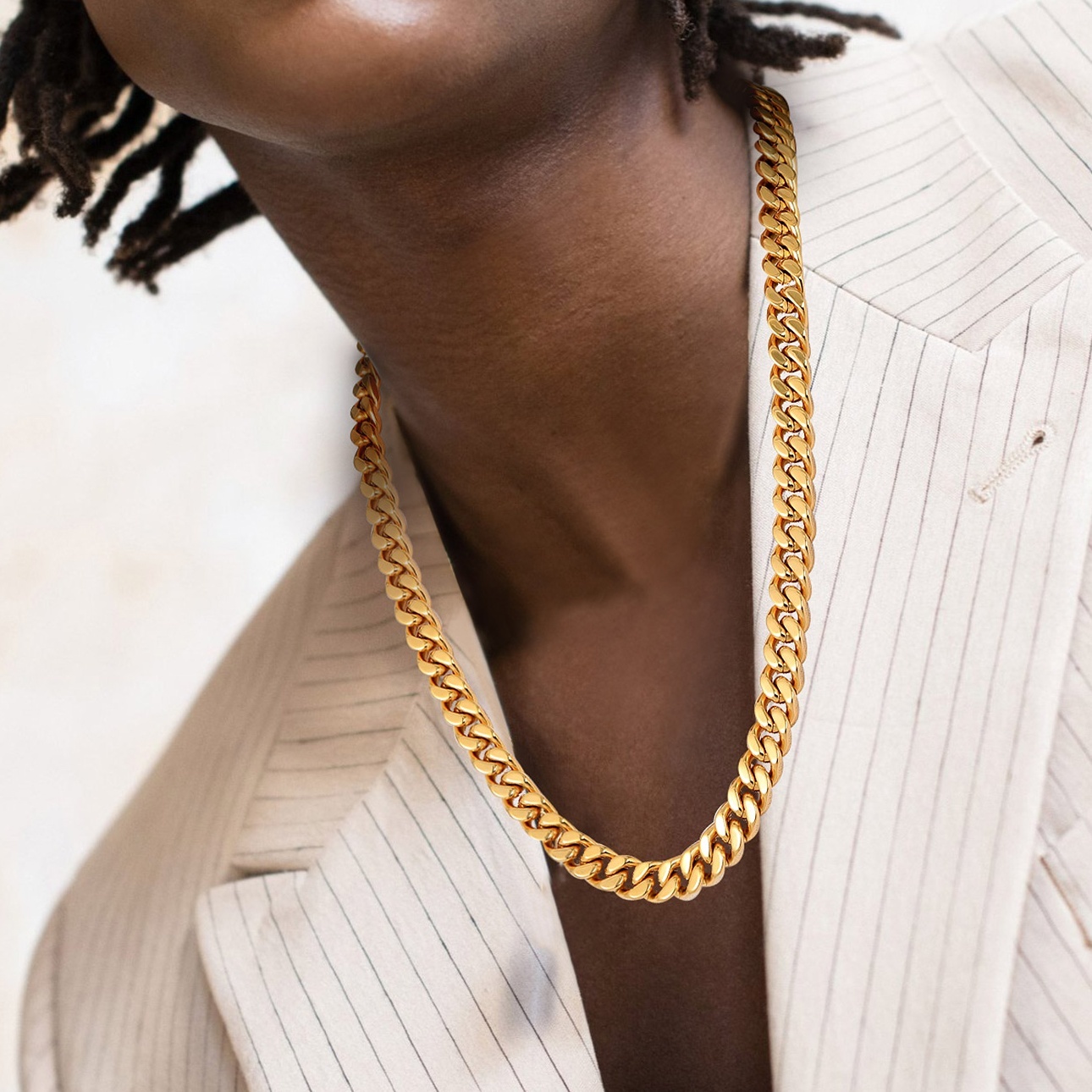man wearing gold Miami Cuban Link Chain Necklace 