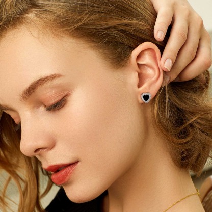 woman wearing Sterling Silver Heart Black Onyx Stud Earrings