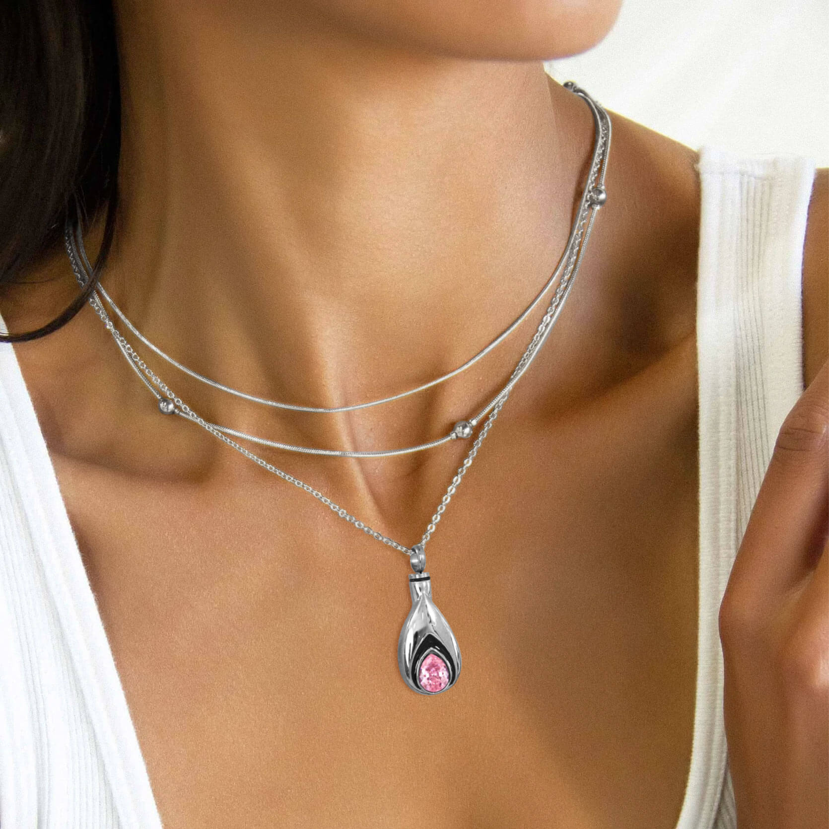 woman wearing silver Birthstone Urn Necklace 
