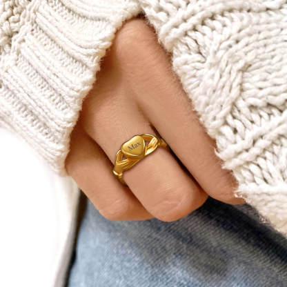 women wearing gold urn ring