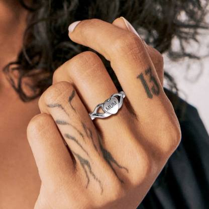 women wearing silver urn ring