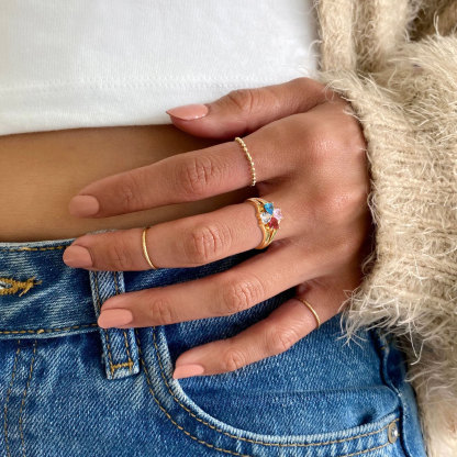women wearing gold Birthstone Promise Ring