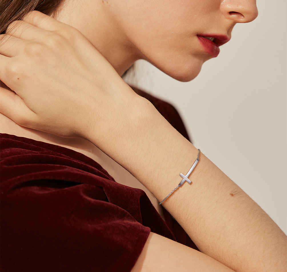 women wearing Sterling Silver Cross Chain Bracelets