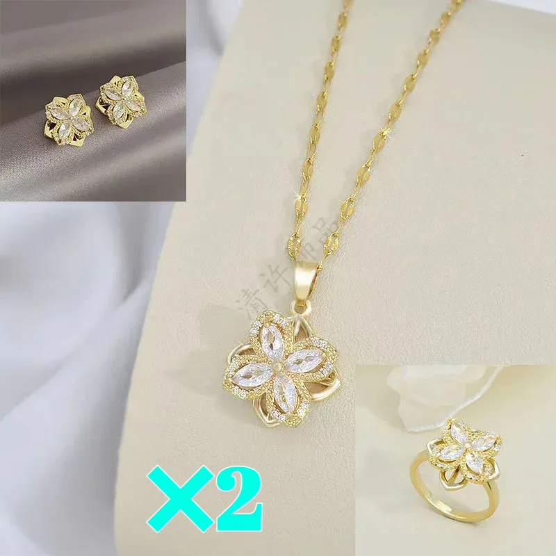 Drehbares Set aus Halskette, Ring und Ohrringen mit vierblättrigem Glückskleeblatt