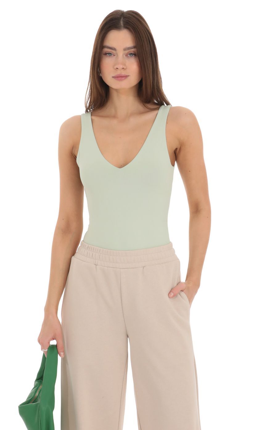 V-Neck Bodysuit in Pistachio-Sunny Prom. All rights reserved.