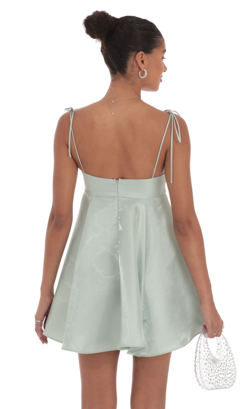 Sheen Flare Babydoll Dress in Sage Green-Sunny Prom. All rights reserved.