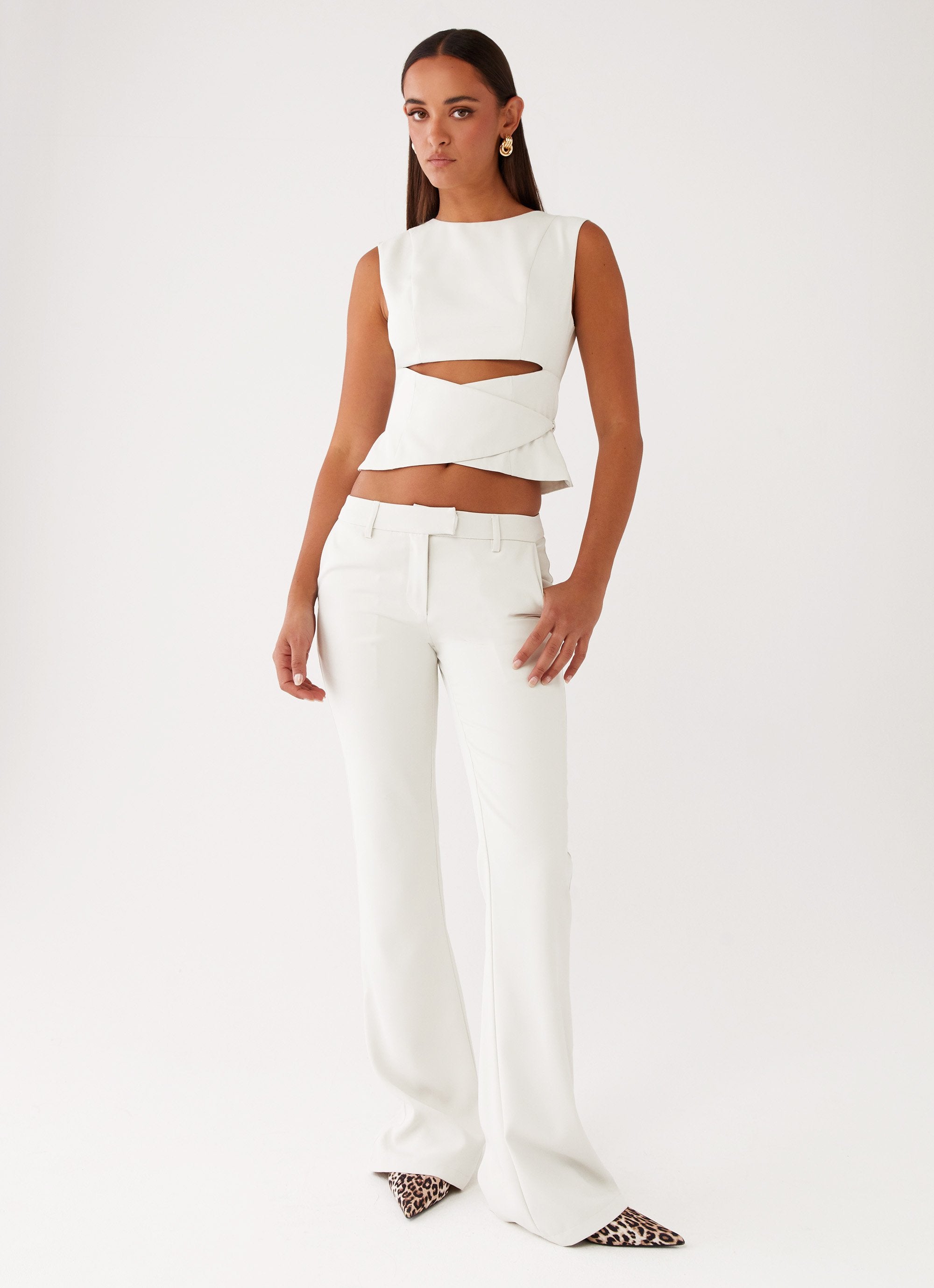 Cyra Low Rise Slim Fit Pants - Ivory-Sunny Prom. All rights reserved.