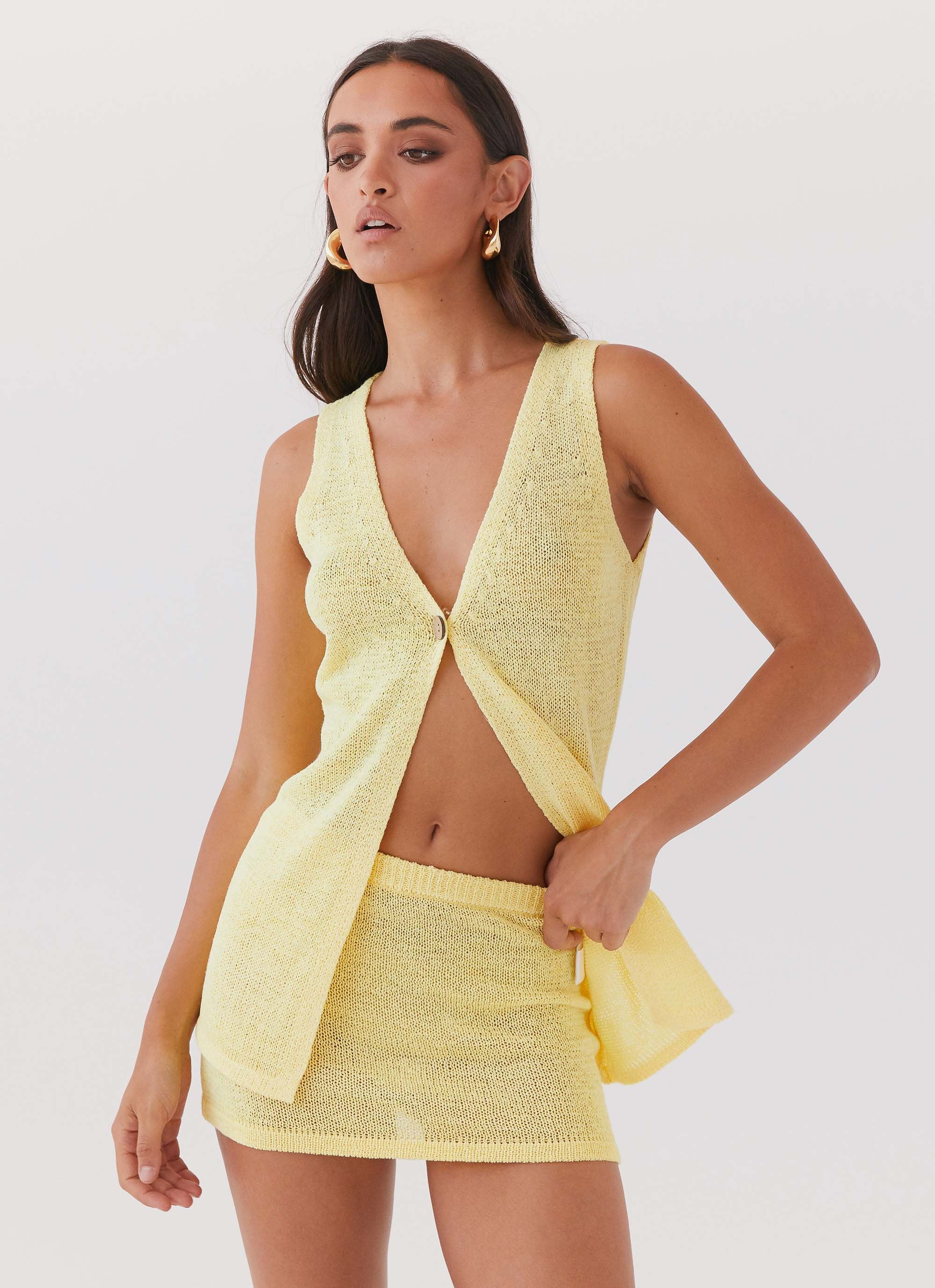 Capri Glow Knit Mini Skirt - Canary-Sunny Prom. All rights reserved.
