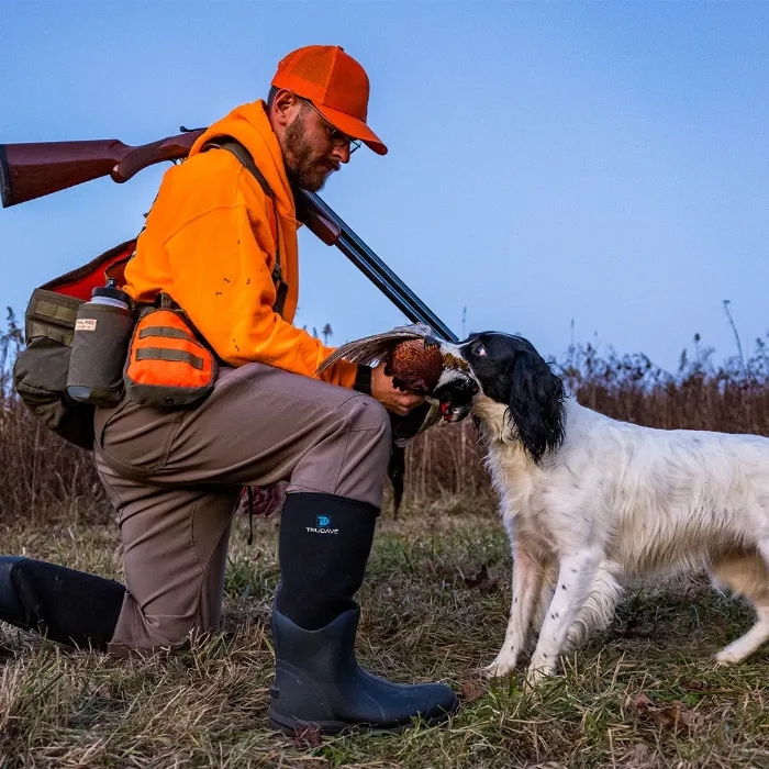 The hunter teases his dog