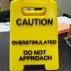 Caution Overstimulated Desk Sign