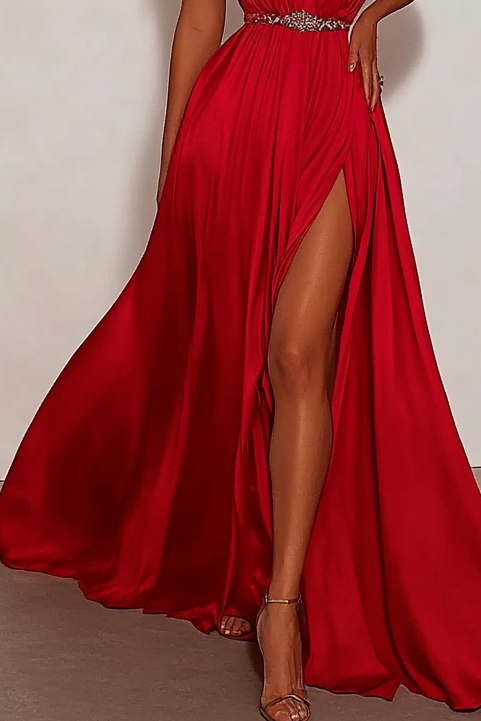 Sexy red halter neck satin gown with backless design and thigh-high slit. Floor-length A-line silhouette made of glossy satin, perfect for galas, fashion-forward events, or evening parties. This bold formal dress is designed to turn heads and exude confidence.