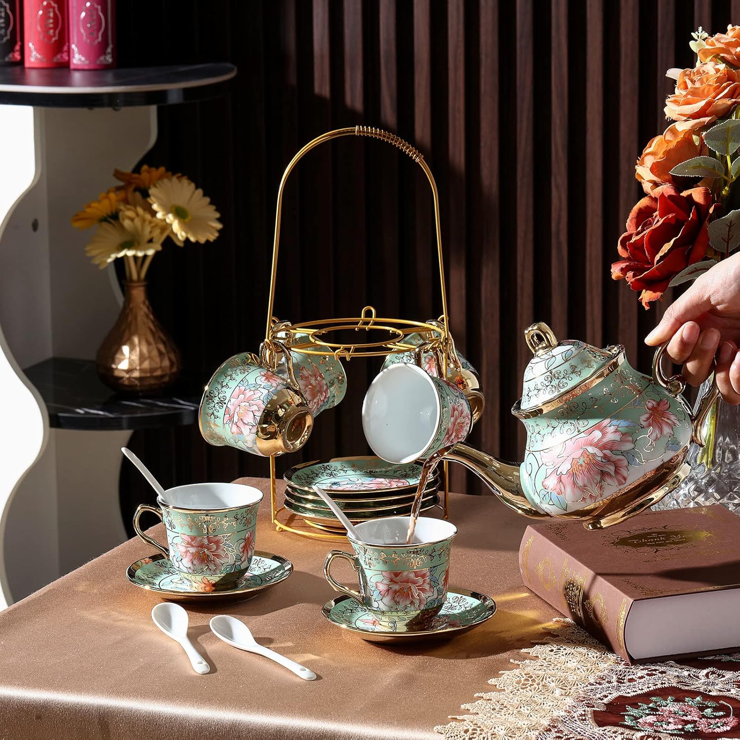 Ceramic afternoon tea set showing floral cups and saucers on the table
