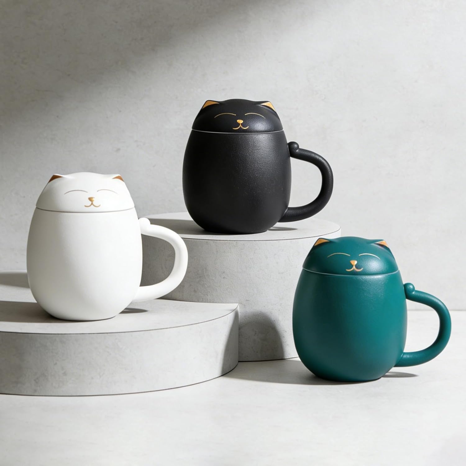 Tea cup with infuser displayed as a complete three-piece brewing set