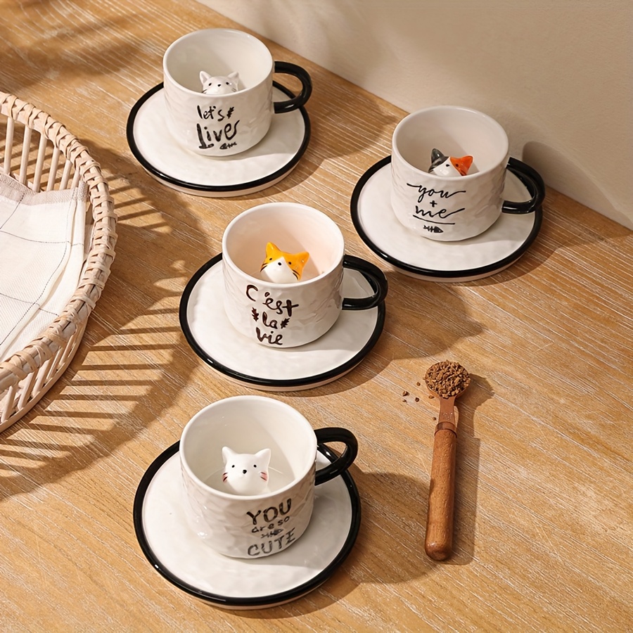Cat inside cup set on table with hidden 3D kitten detail