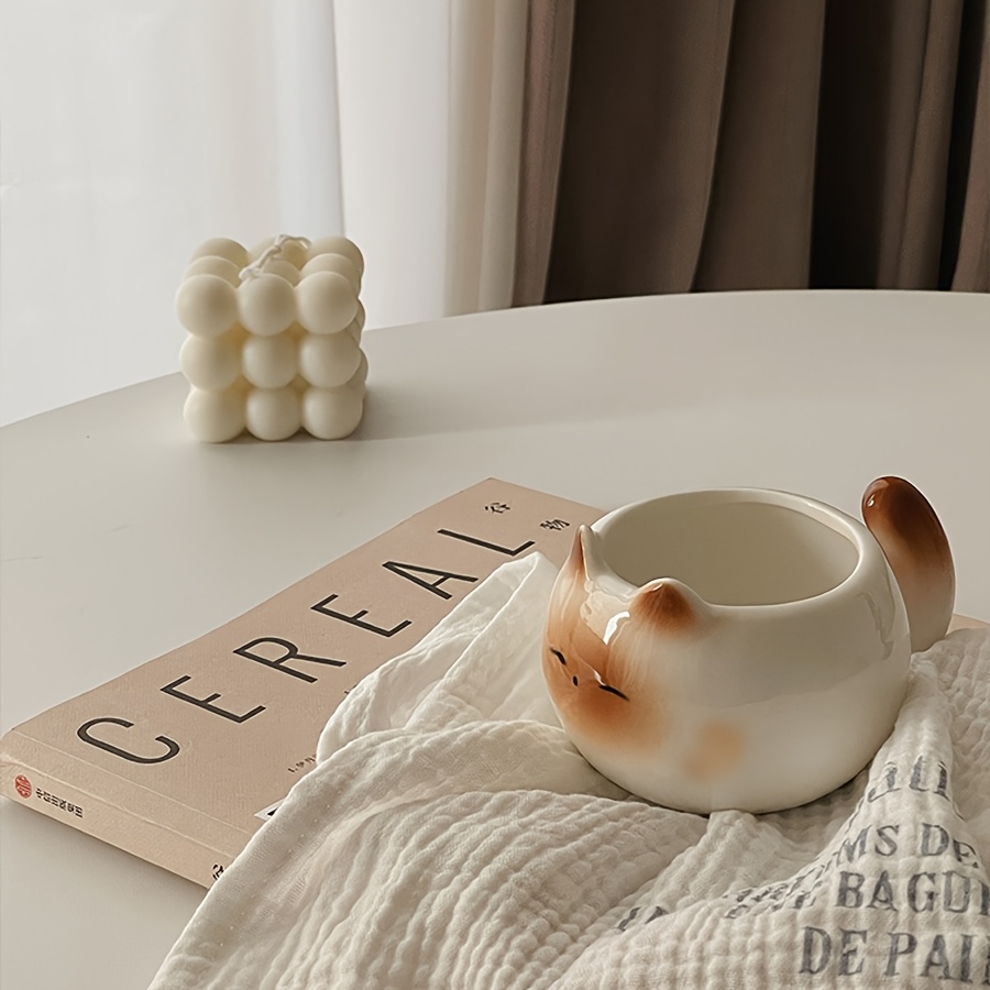 Siamese cat mug on table with cat-ear rim