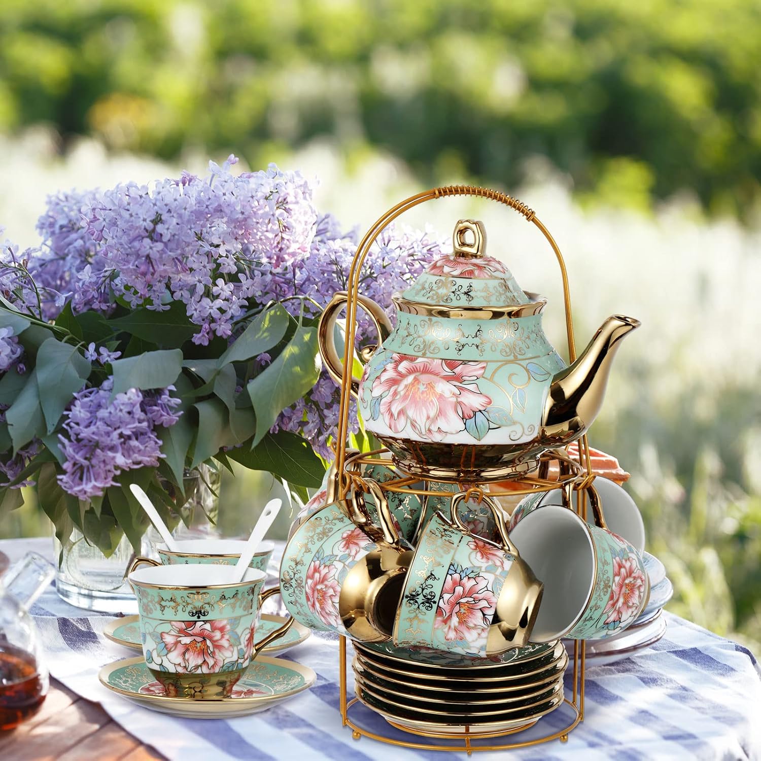 British tea set with metal stand holding the coordinated serving pieces