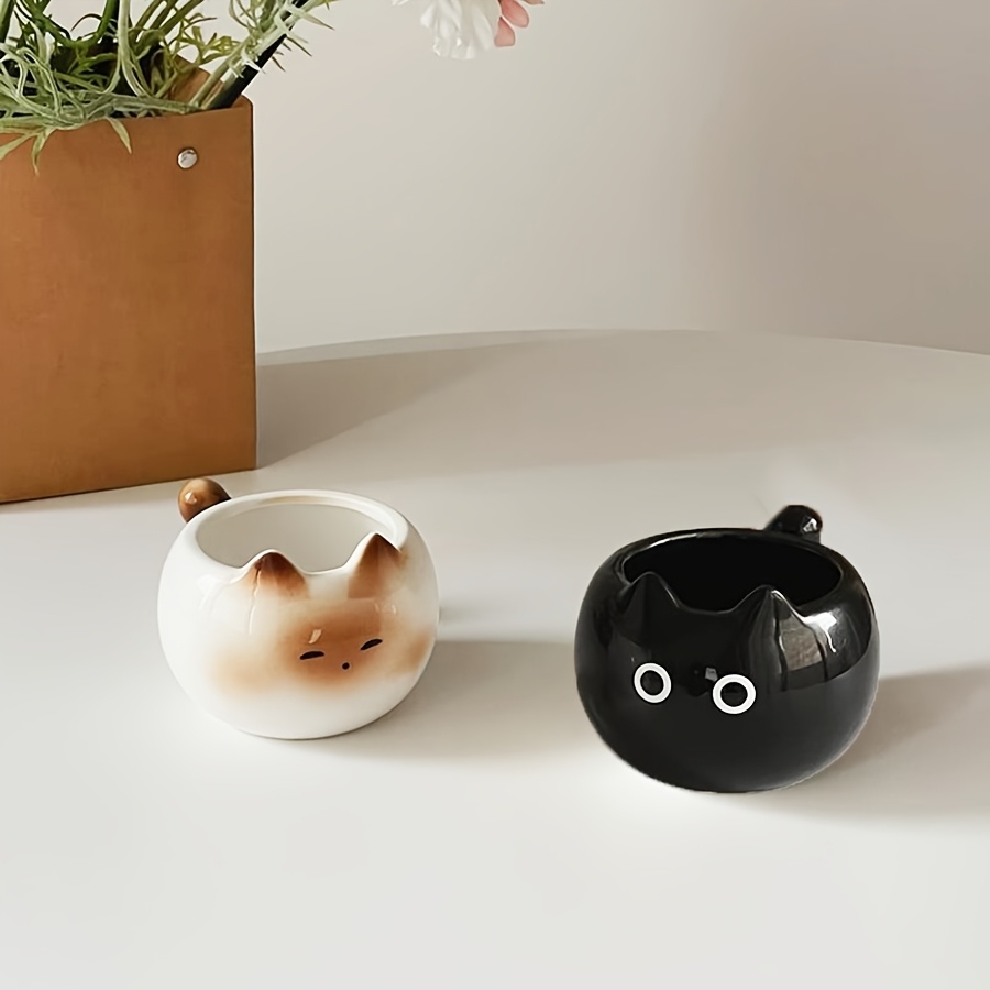 Siamese cat cup and black cat cup side by side