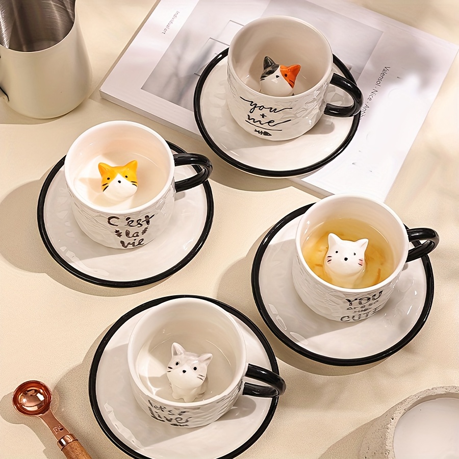 Mug with cat inside in four ceramic cup and saucer styles