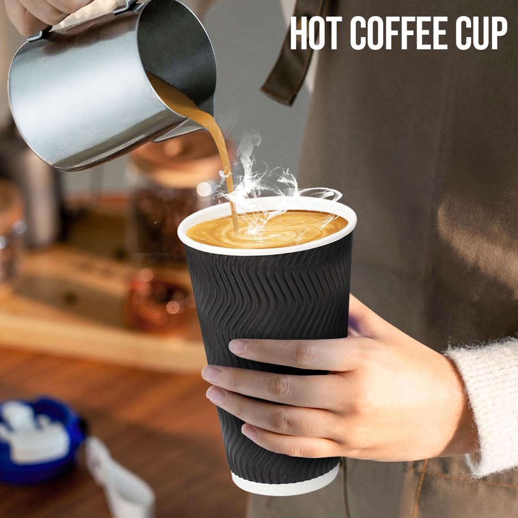 Black paper hot cup being filled with coffee