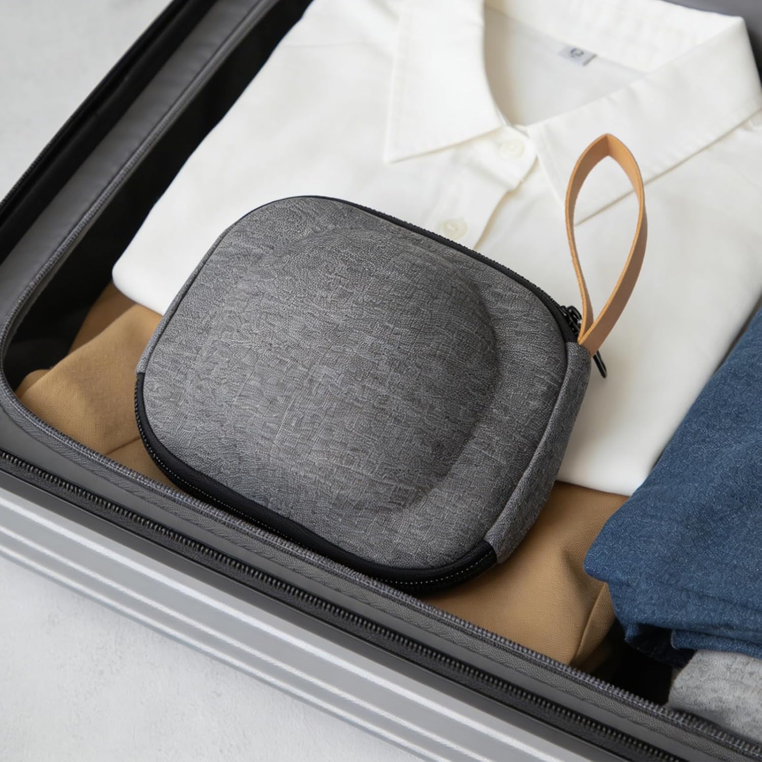 Gray carry case for the ceramic travel gaiwan packed in a suitcase