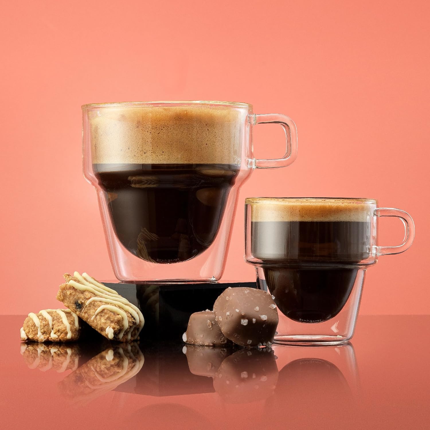Two 5 oz stackable double wall glass espresso cups shown side by side