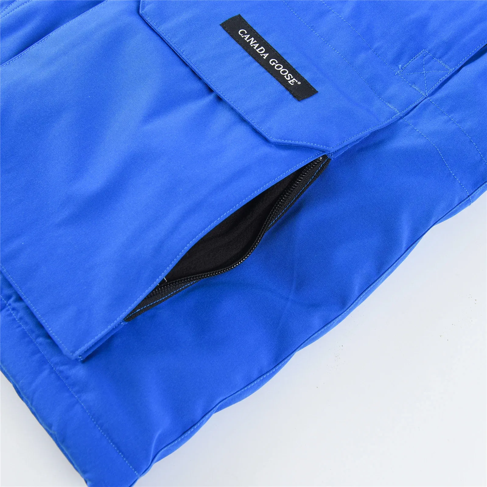 カナダグース エクスペディション パーカー 4660M、ユニセックス ダウンジャケット、ミドル丈コート（ブルー）。