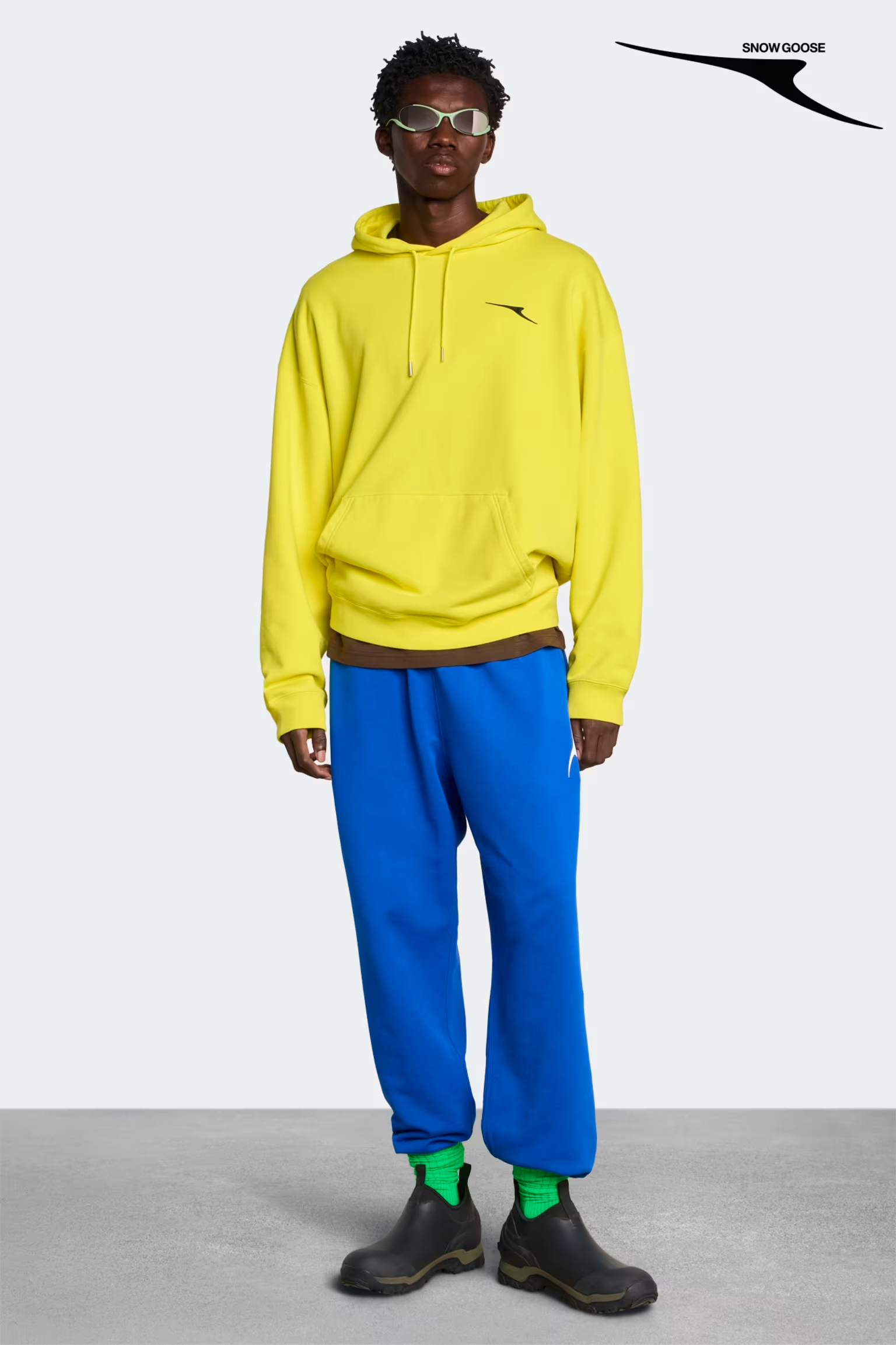 カナダグース リゲル オーバーサイズ プリント フード付きスウェットシャツ ユニセックス (サマーアース)