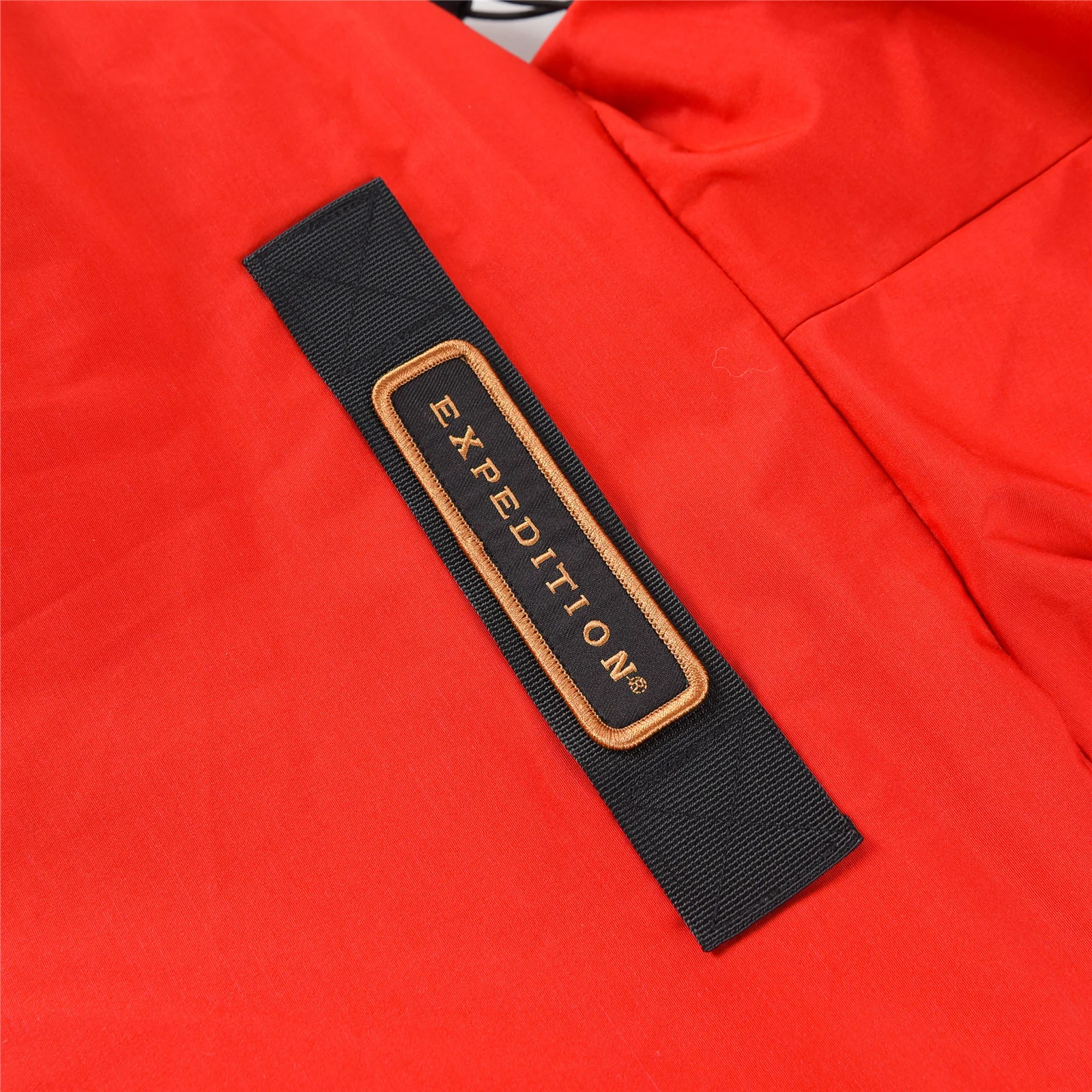 カナダグース エクスペディション パーカー 4660M、ユニセックス ダウンジャケット、ミドル丈コート（レッド）。