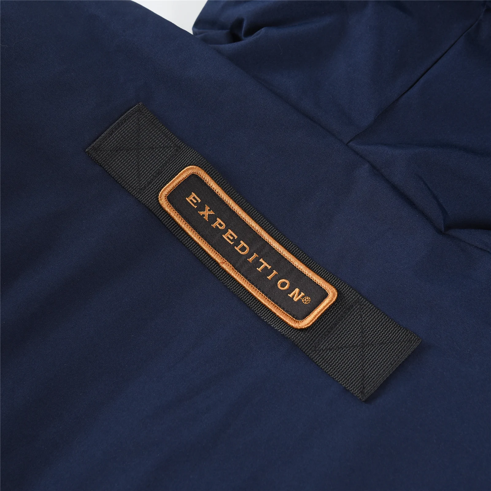 カナダグース エクスペディション パーカー 4660M ユニセックス ダウンジャケット ミドル丈コート (ネイビーブルー)。