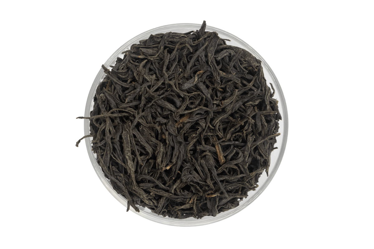 Twisted leaves of Royal Keemun Mao Feng with rich chestnut and golden hues