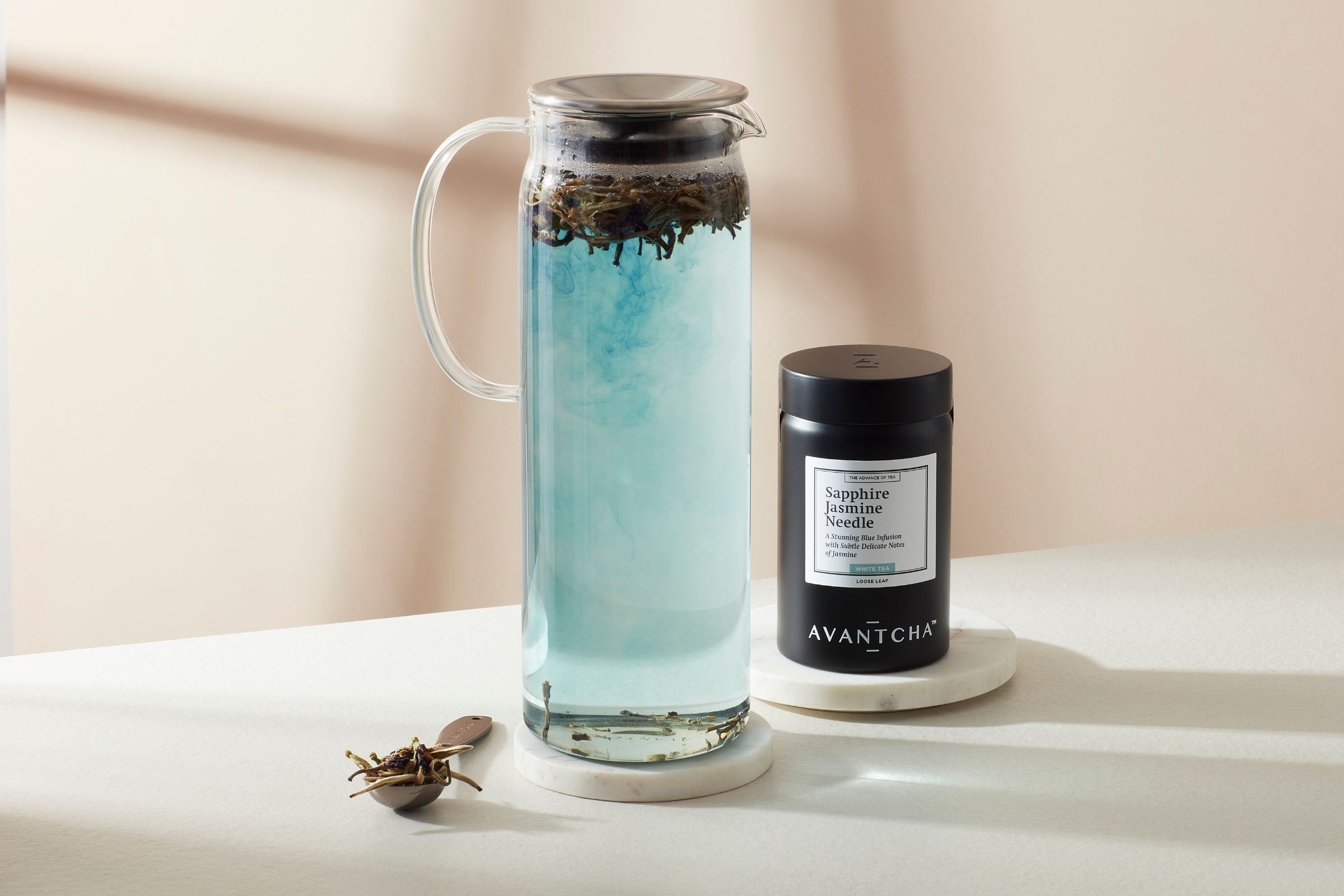 Brewing Sapphire Jasmine Needle to create stunning blue infusion
