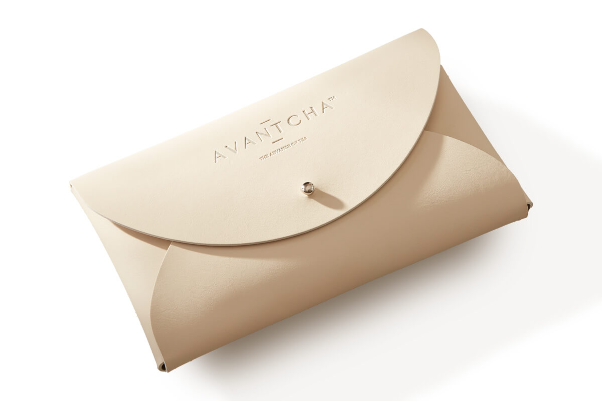 Travel Tea Pouch in beige with 8 premium silk teabags, lightweight PU leather, perfect for tea lovers on the go