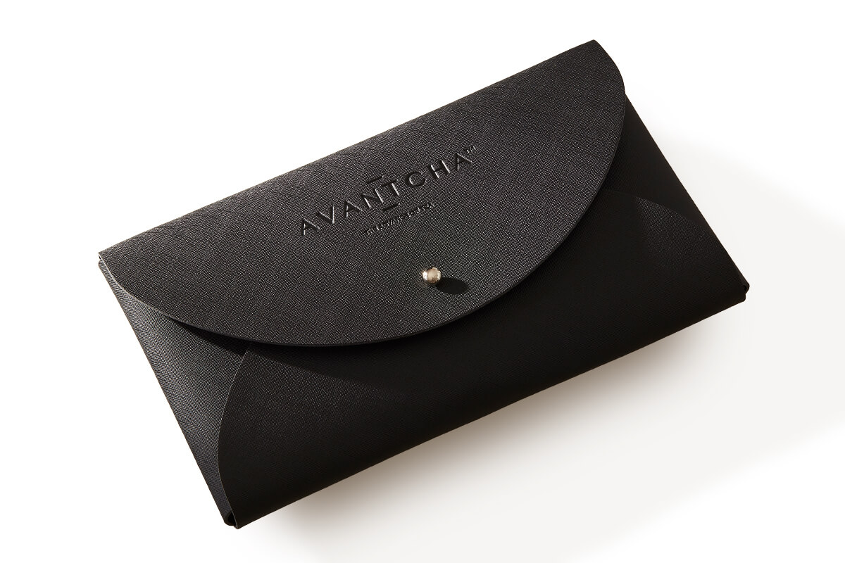 Travel Tea Pouch in black with 8 premium silk teabags, lightweight PU leather, perfect for tea lovers on the go