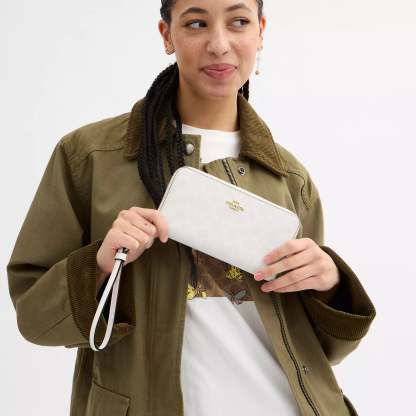 Coathtch Outlet Long Zip Around Wallet In Signature Canvas