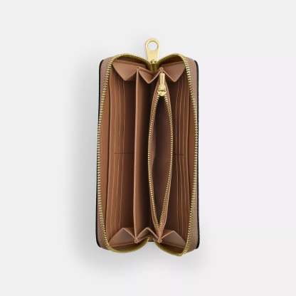 Coathtch Outlet Long Zip Around Wallet In Signature Canvas