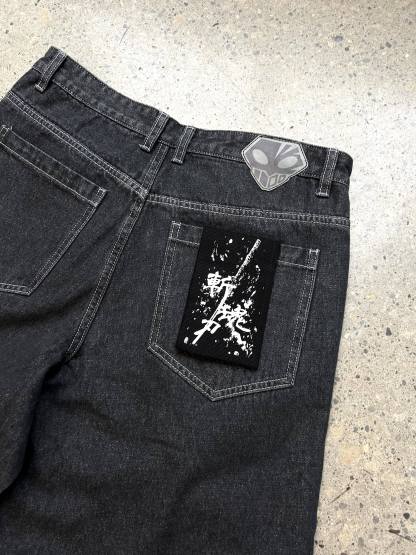 "CONFLICT" JEANS